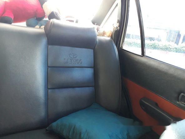 Bán Daewoo Nexia đời 1994, màu trắng số sàn, 70tr