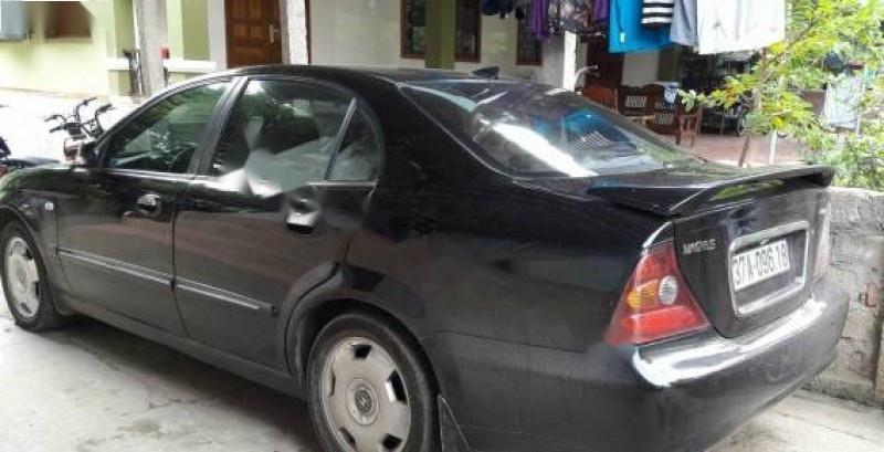 Bán Daewoo Magnus 2.5AT đời 2004, màu đen, xe nhập giá cạnh tranh