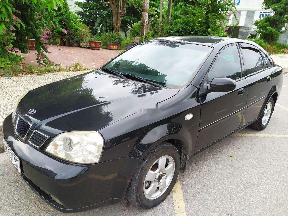Nhà bán Daewoo Lacetti EX đời 2005, màu đen số sàn