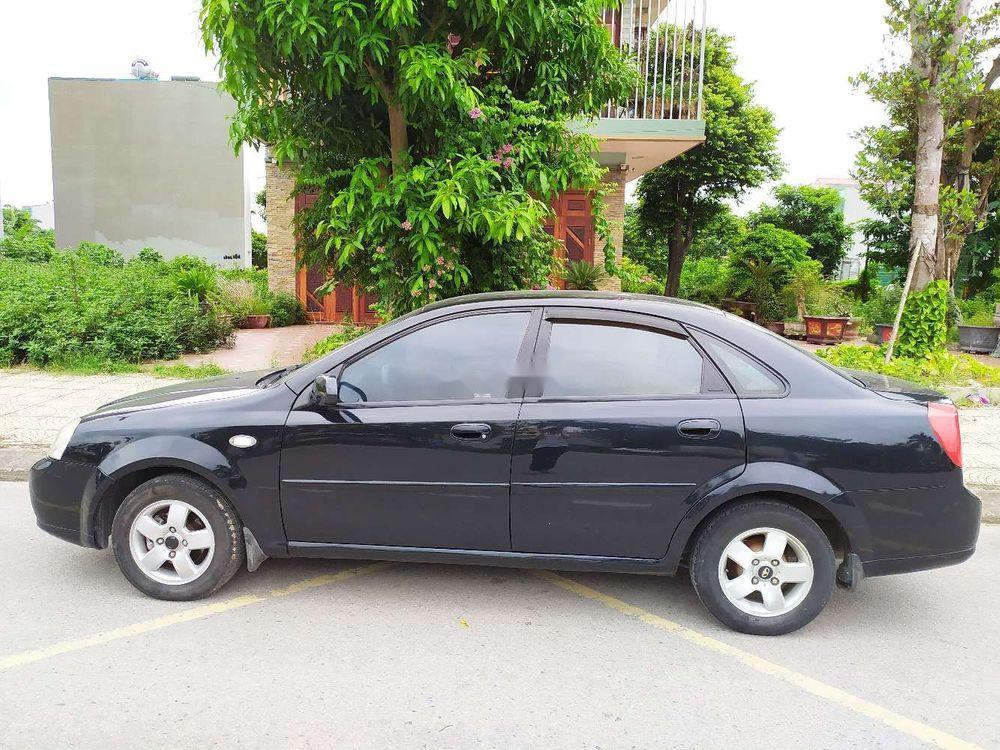 Nhà bán Daewoo Lacetti EX đời 2005, màu đen số sàn