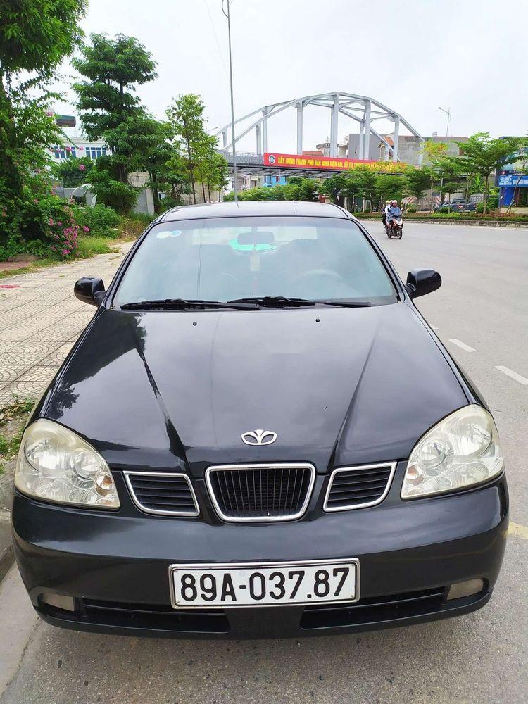 Nhà bán Daewoo Lacetti EX đời 2005, màu đen số sàn
