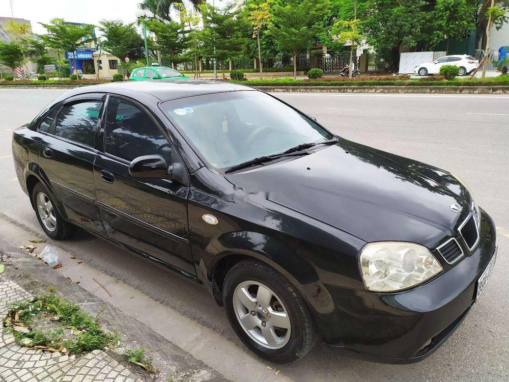 Nhà bán Daewoo Lacetti EX đời 2005, màu đen số sàn