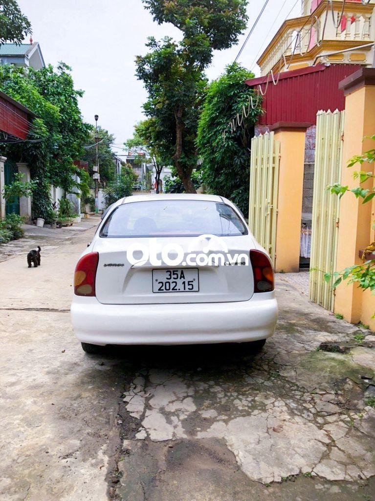 Lanos Daewoo 2001 trắng xe gia đình sử dụng