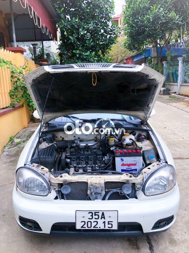 Lanos Daewoo 2001 trắng xe gia đình sử dụng