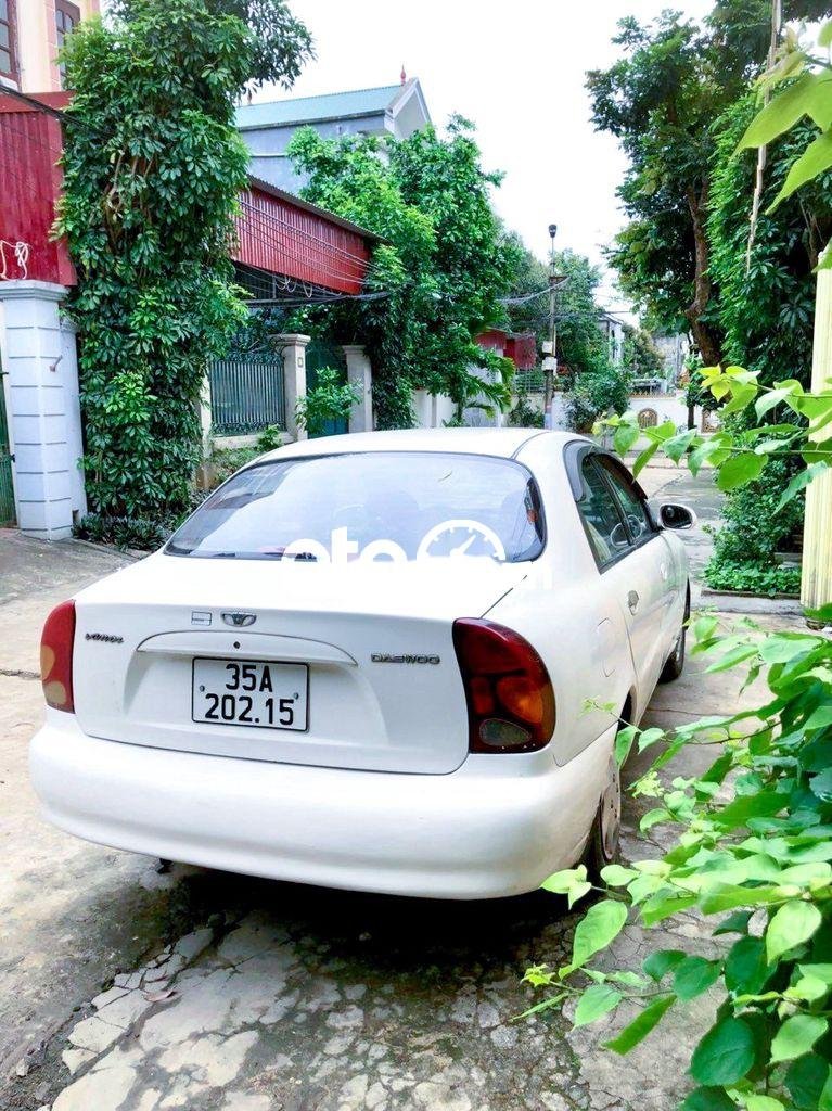 Lanos Daewoo 2001 trắng xe gia đình sử dụng