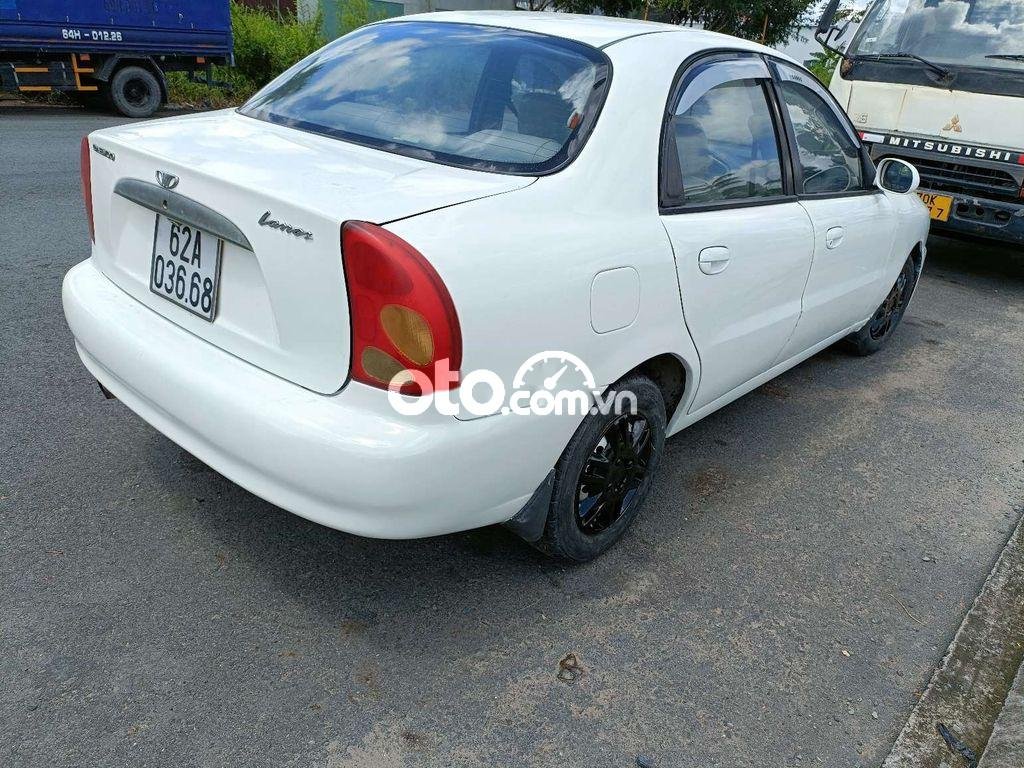 Lanos SX 2002.5chổ .xe đẹp máy êm kiểm mới.