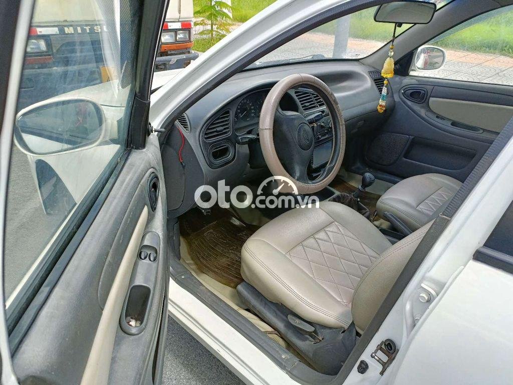 Lanos SX 2002.5chổ .xe đẹp máy êm kiểm mới.