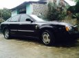 Cần bán xe Daewoo Magnus năm 2004, màu đen số tự động