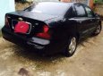 Cần bán xe Daewoo Magnus năm 2004, màu đen số tự động