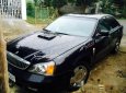 Cần bán xe Daewoo Magnus năm 2004, màu đen số tự động