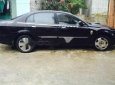 Cần bán xe Daewoo Magnus năm 2004, màu đen số tự động