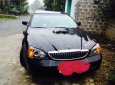 Bán xe Daewoo Magnus đời 2004, màu đen số tự động, giá tốt