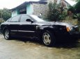 Bán xe Daewoo Magnus đời 2004, màu đen số tự động, giá tốt