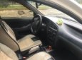 Cần bán Daewoo Lanos LX đời 2004, màu trắng xe gia đình