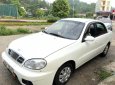 Cần bán Daewoo Lanos LX đời 2004, màu trắng xe gia đình