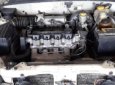 Cần bán Daewoo Lanos LX đời 2004, màu trắng xe gia đình