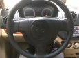 Bán xe cũ Daewoo Gentra 1.5 SX đời 2011, màu đen xe gia đình