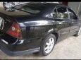 Cần bán gấp Daewoo Magnus năm 2007, màu đen, giá 220tr