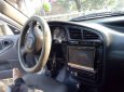 Cần bán gấp Daewoo Lanos đời 2004, màu trắng