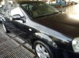 Bán xe Daewoo Nubira đời 2002, màu đen xe gia đình