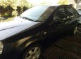 Bán xe Daewoo Nubira đời 2002, màu đen xe gia đình