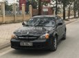 Cần bán xe Daewoo Magnus 2.0 đời 2007, màu đen