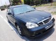 Chính chủ bán Daewoo Magnus 2.0 MT 2004, màu đen