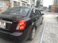 Cần bán gấp Daewoo Lacetti sản xuất 2005 màu đen, 168 triệu