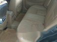 Cần bán Daewoo Magnus sản xuất năm 2004, màu đen, giá 160tr