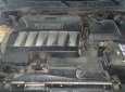 Cần bán Daewoo Magnus sản xuất năm 2004, màu đen, giá 160tr