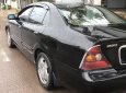Cần bán gấp Daewoo Magnus đời 2004, màu đen giá cạnh tranh