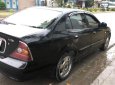 Cần bán gấp Daewoo Magnus đời 2004, màu đen giá cạnh tranh