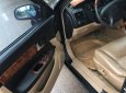 Cần bán gấp Daewoo Magnus đời 2004, màu đen giá cạnh tranh