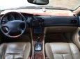 Cần bán gấp Daewoo Magnus đời 2004, màu đen giá cạnh tranh