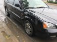 Cần bán gấp Daewoo Magnus đời 2004, màu đen giá cạnh tranh