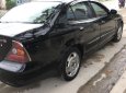 Cần bán xe Daewoo Magnus 2.5 AT đời 2004, màu đen