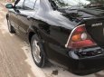 Cần bán xe Daewoo Magnus 2.5 AT đời 2004, màu đen