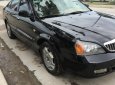 Cần bán xe Daewoo Magnus 2.5 AT đời 2004, màu đen
