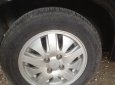 Cần bán Daewoo Nubira E đời 2002, màu đen, giá chỉ 90 triệu