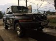 Cần bán Daewoo Karando MT đời 2000, màu đen, đăng kiểm mới