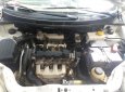 Cần bán xe Daewoo Gentra sx năm 2010, màu trắng, 220 triệu