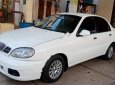 Cần bán Daewoo Lanos SX sản xuất 2005, màu trắng xe gia đình giá cạnh tranh