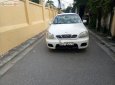 Gia đình cần bán Daewoo Lanos SX đời 2004, màu trắng, giá 72tr