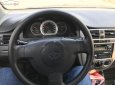 Bán xe Daewoo Lacetti EX Sx 2005, số tay, máy xăng, màu bạc, nội thất màu xám, odo 80000 km