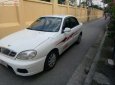 Gia đình cần bán Daewoo Lanos SX đời 2004, màu trắng, giá 72tr