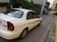 Gia đình cần bán Daewoo Lanos SX đời 2004, màu trắng, giá 72tr