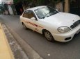 Gia đình cần bán Daewoo Lanos SX đời 2004, màu trắng, giá 72tr