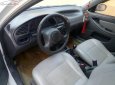 Gia đình cần bán Daewoo Lanos SX đời 2004, màu trắng, giá 72tr