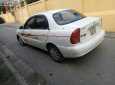 Gia đình cần bán Daewoo Lanos SX đời 2004, màu trắng, giá 72tr