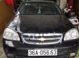 Cần bán Daewoo Lacetti Ex đời 2005, màu đen, xe gia đình sử dụng nên rất giữ xe